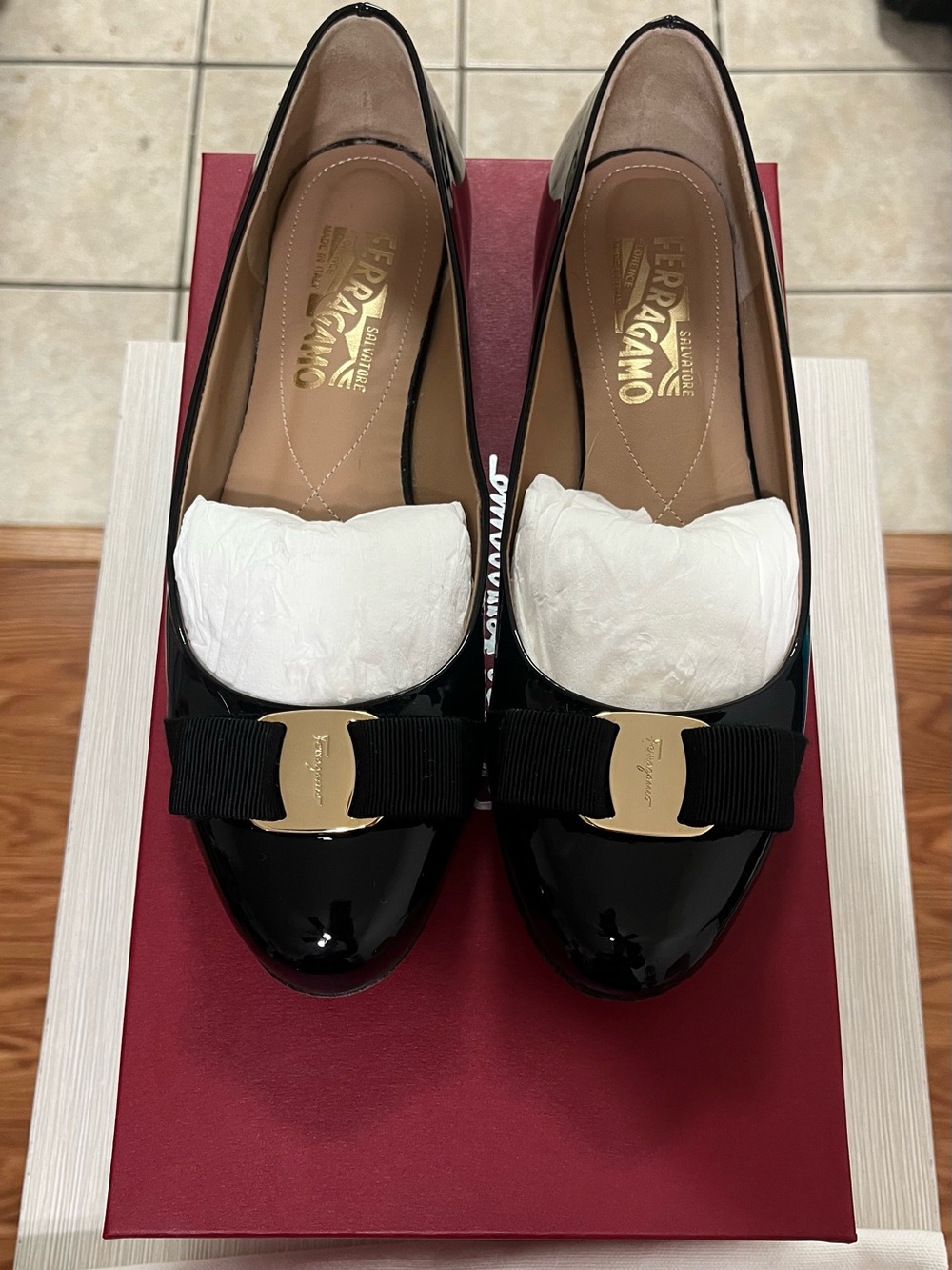 Ferragamo black patent ballerinas